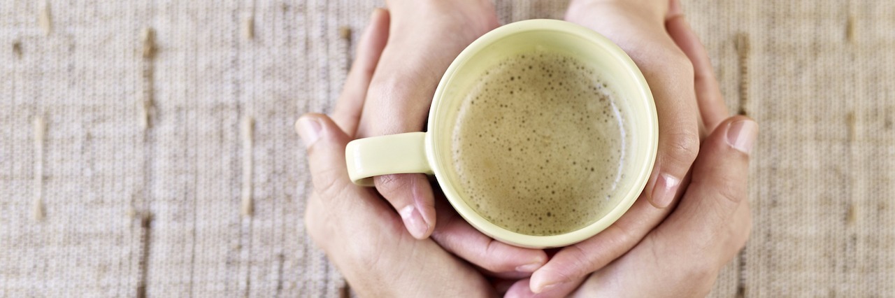 To the One Contemplating Self-Harm two sets of hands holding the same coffee cup