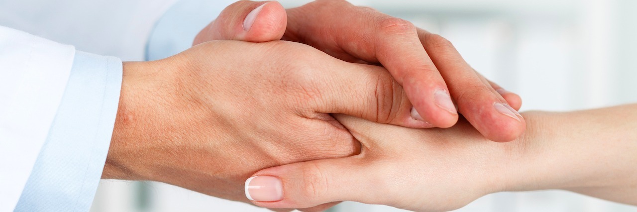 Letter to Doctor Who Was Understanding About My Mental Illness doctor holding his patient's hand