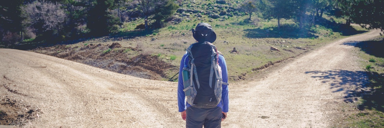 What to Know About Someone in Mental Illness Recovery man choosing between two different paths