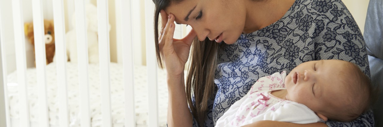 Postpartum Depression: Struggling to Love Your Child Tired Mother Suffering From Post Natal Depression