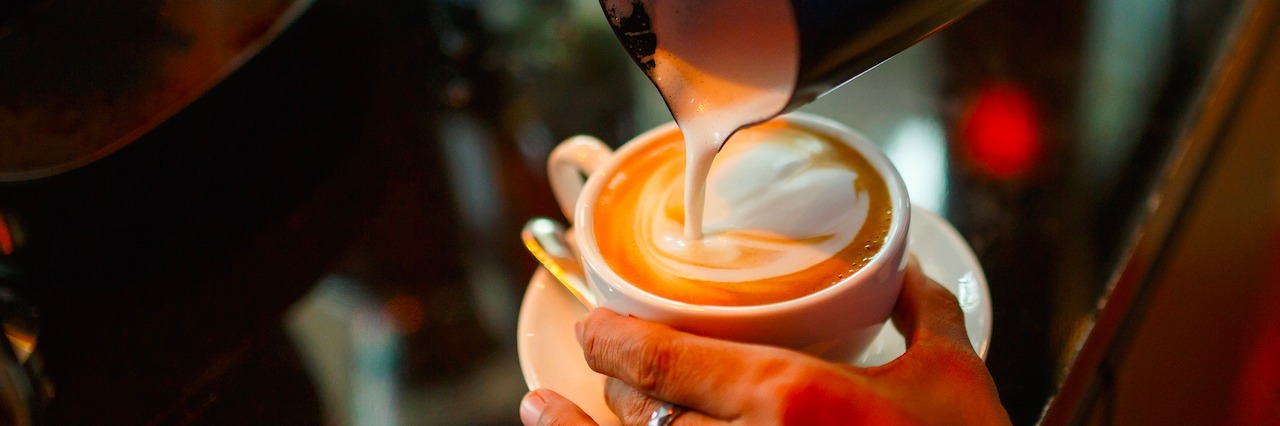 Finding Beauty in a Life With Depression Barista making cappuccino in the coffeeshop