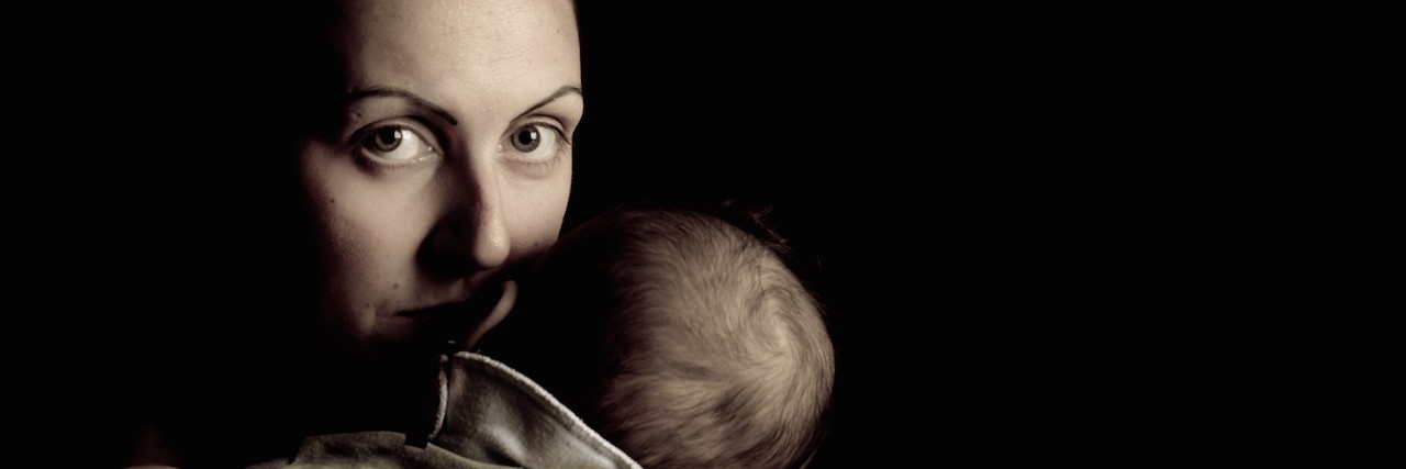 What It's Like to Have Hidden Postpartum Depression A mother and her child