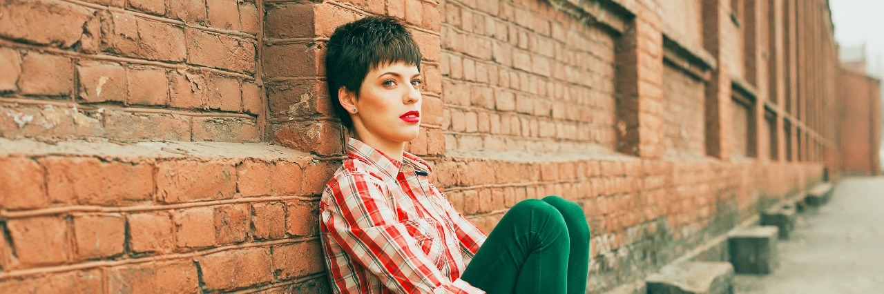 My Response to 'You Have Asperger's, You're Not Autistic' Outdoor portrait of young woman with short Hair