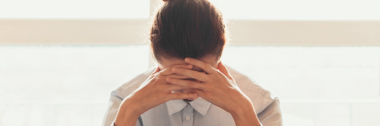 When Anxiety and Depression Come out of Nowhere anxious woman in the office