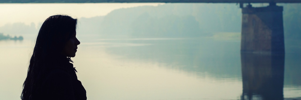 Borderline Personality Disorder: 5 Things I Wish My Friends Knew Silhouette of beautiful girl and bridge in autumn