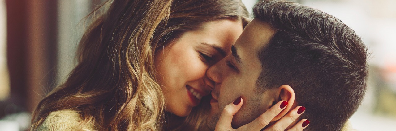 How to Help a Spouse With Major Depressive Disorder and Anxiety Couple in love drinking coffee in coffee shop