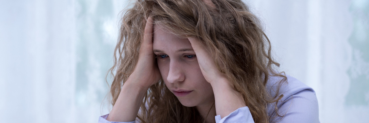 Responding to Bullying Comments About Disability Young woman being bullied on the internet.