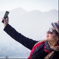 woman making a selfie with her smart phone.