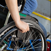 Wheelchair user trying to board a bus.