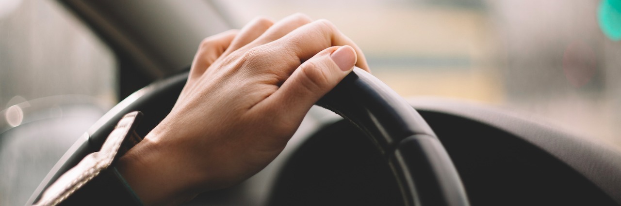 My Autism: A Day in My Life Hand on steering wheel while driving a car