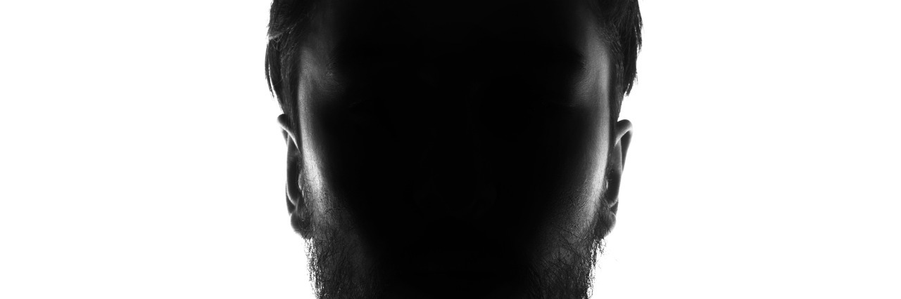 What Does Anxiety Feel Like Hidden face in the shadow.male person silhouette.