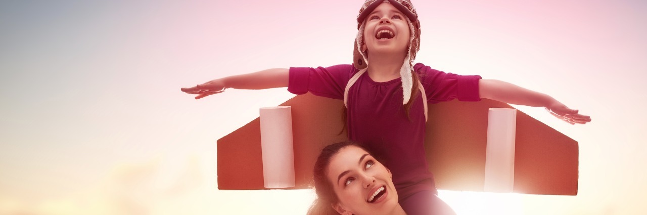 My Children See Their Mom Struggle With Mental Illness Mother and her child playing together.