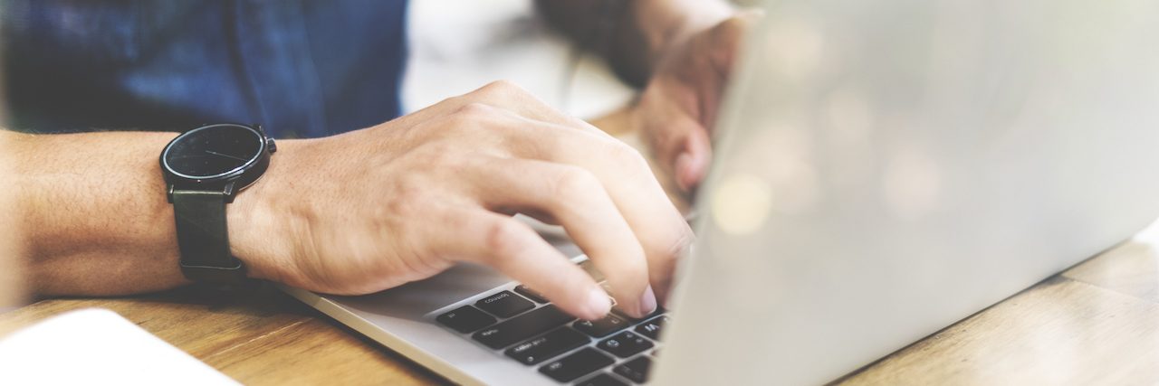 A Letter to My Co-Workers, From a Man With Bipolar Disorder A man working on a laptop