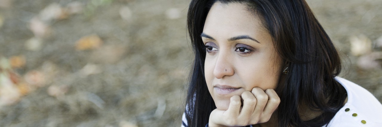 Struggling With My Body-Focused Repetitive Behavior, Ear Scratching Frustrated young Indian woman contemplating her thoughts