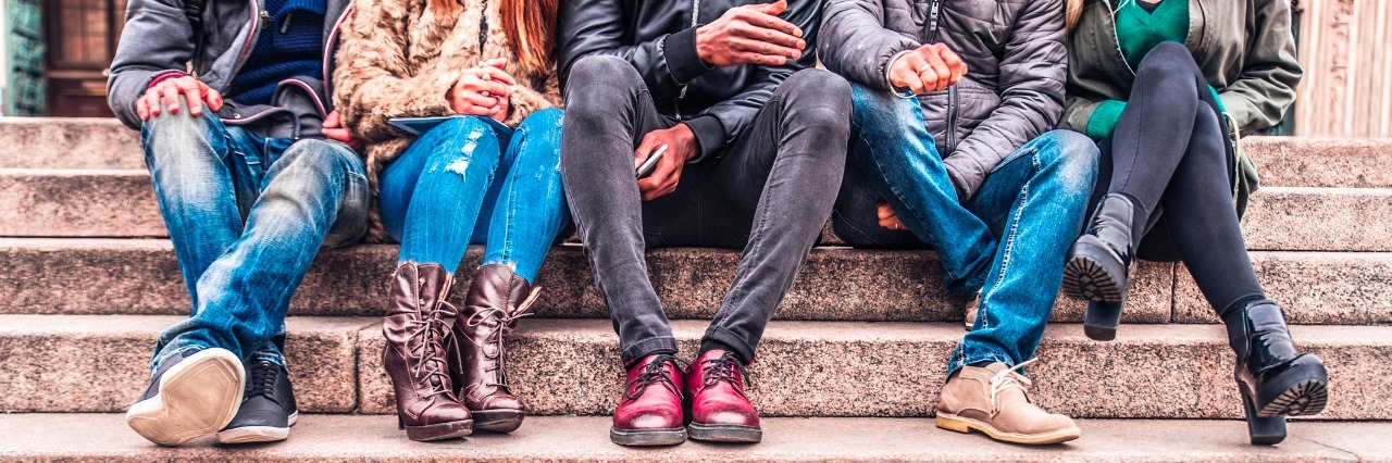 10 Things to Tell Your Friends About Lupus Group of people sitting on a staircase outdoors