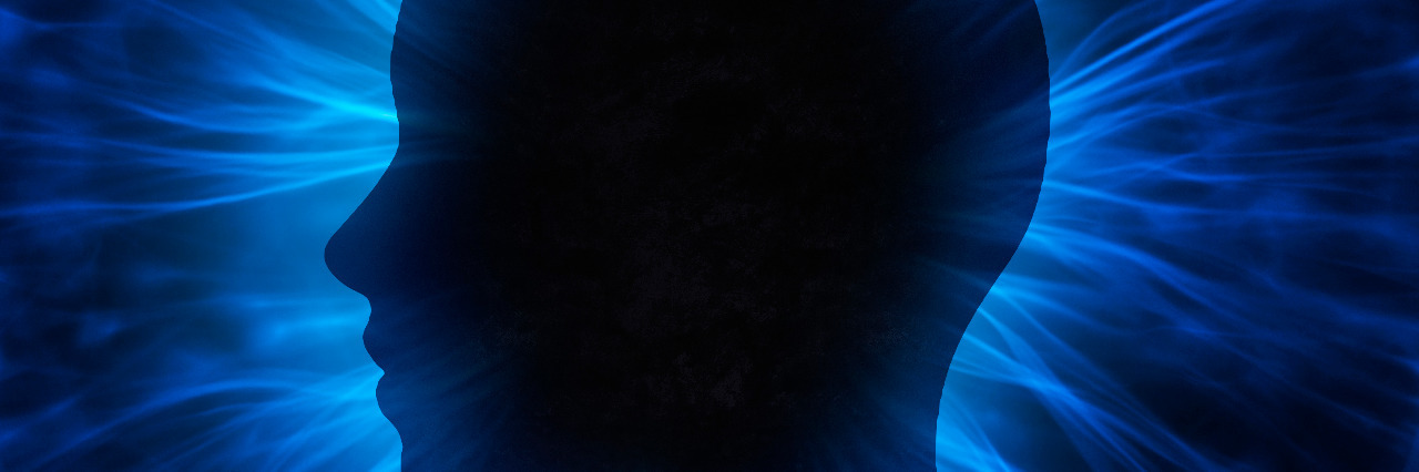 Accepting My Mind on the Autism Spectrum Human head with colorful beams.