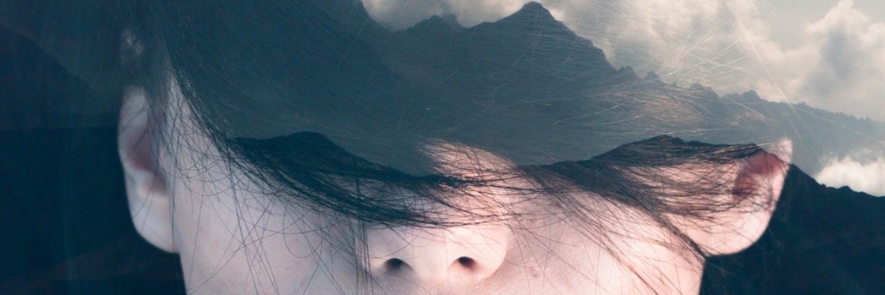 abstract photo of a woman with cloud coming out of her head