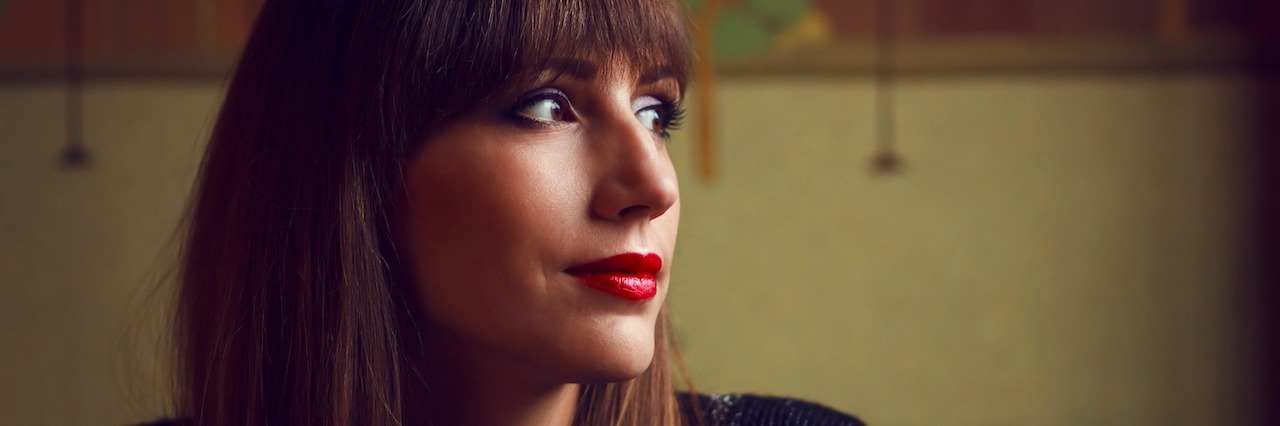 Depression Does Not Mean I Am Suicidal young woman looking to the side