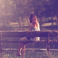 Girl sitting on a bench