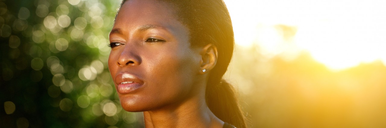 Close up portrait of an black woman outdoors