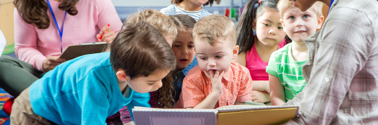 Representation of Cerebral Palsy in Children's Books Children reading at story time.