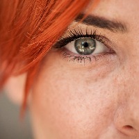 Close up shot of woman eye looking at camera
