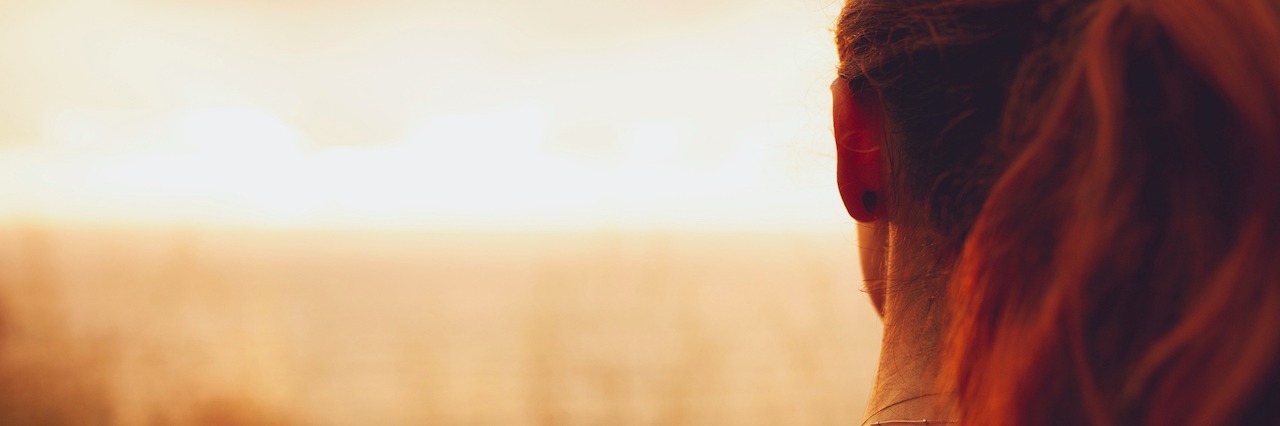 What Is Someone With Generalized Anxiety Disorder Like? woman watching the sunset