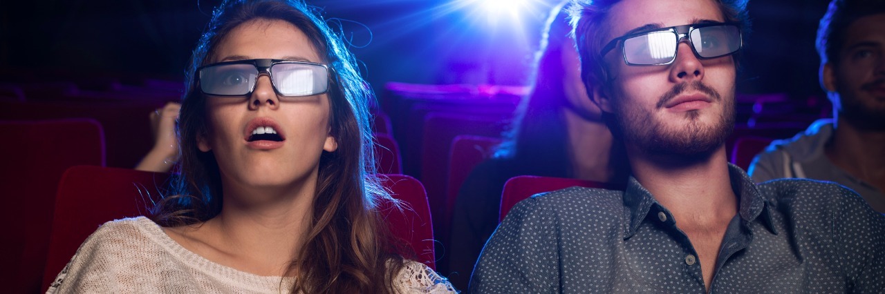 OCD: How I Cope With Contamination Fears at the Movies Couple watching a movie wearing 3-D glasses