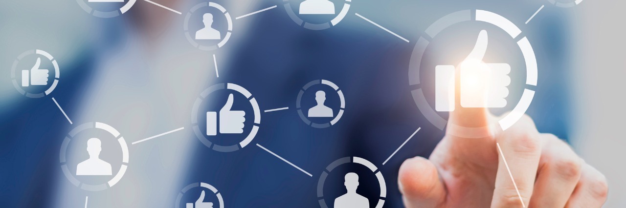 Ideas for Making a Difference Person touching like buttons