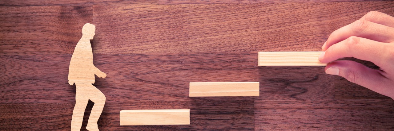 Thank You to the People Who Helped Me on My Recovery Journey person climbing steps