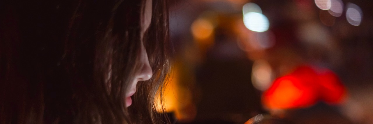 To the Girl With Depression Who Feels Perpetually Single Girl using smart phone at night