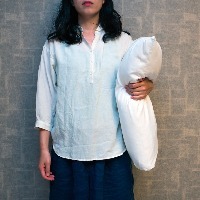 woman holding a pillow