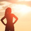 silhouette of woman look and think with sunlight