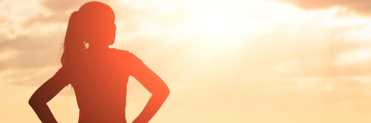 Tips for Fighting Ignorance About Ehlers-Danlos Syndrome silhouette of woman look and think with sunlight