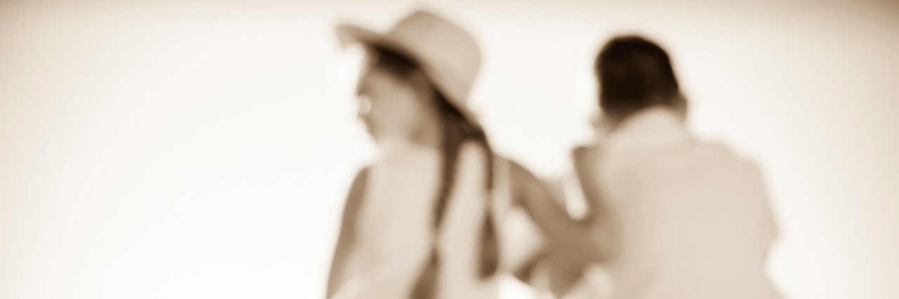 Feeling Guilty and Depressed After the Death of a Sibling Siblings sitting on the beach, looking at the water