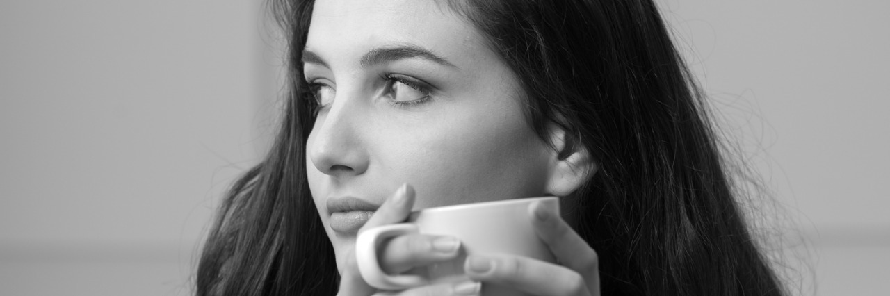 Woman having a coffee