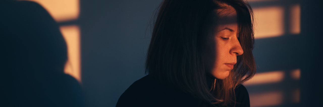 The Words People With Depression Leave Unsaid A man in shadow