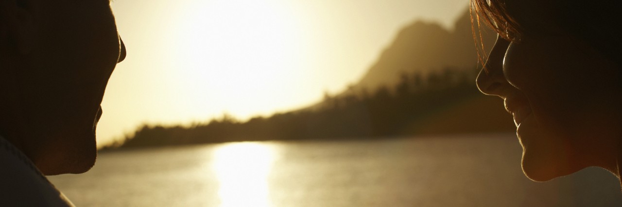 Talking to My Parents About Depression and Suicidal Ideation mother and son Watching Sunset over Lake