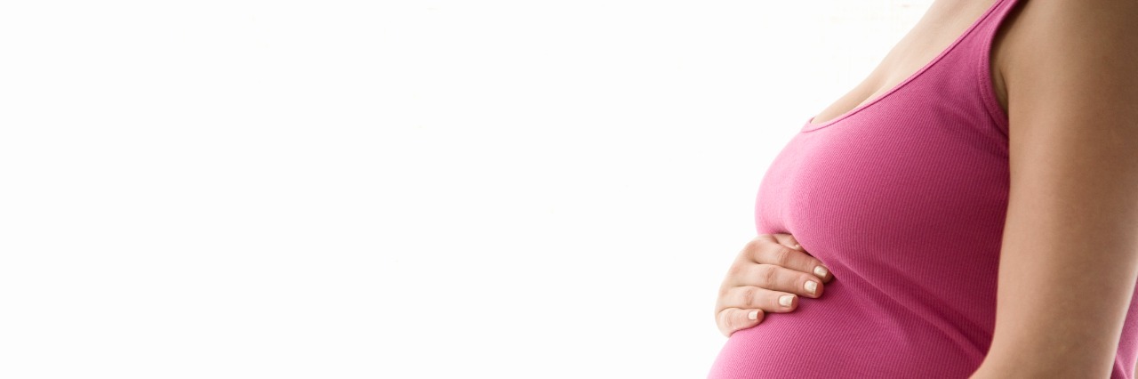 Dealing With Anxiety During Pregnancy Pregnant woman, mid section