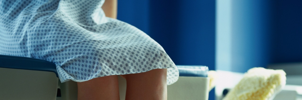 Response to Senate Vote on the Affordable Care Act by Teen With EDS Patient Waiting on Examination Table