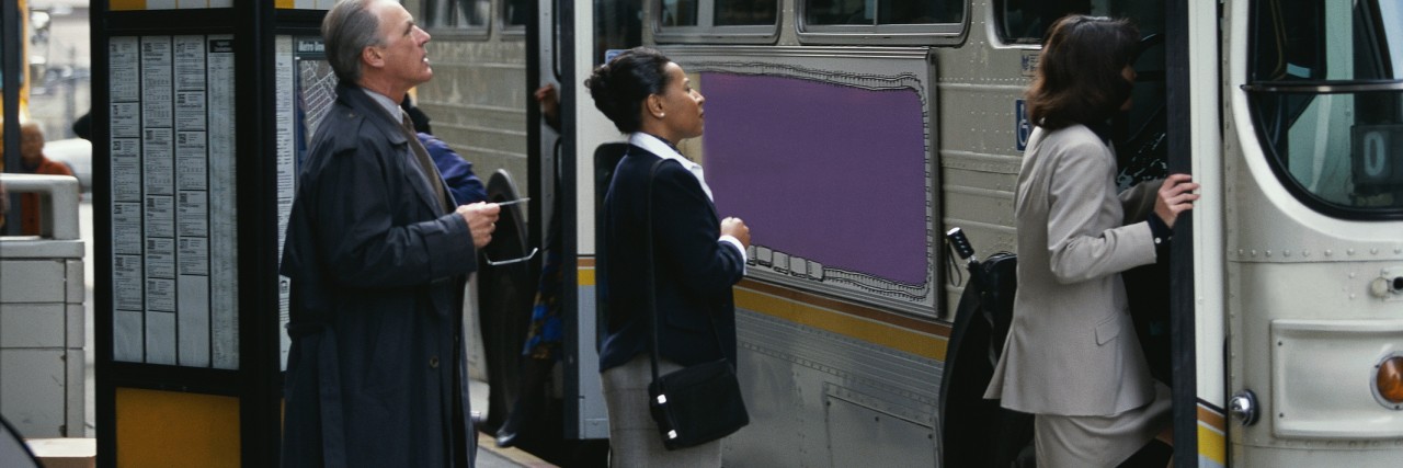 Judged for Having an Invisible Disability on the Bus People boarding a bus.