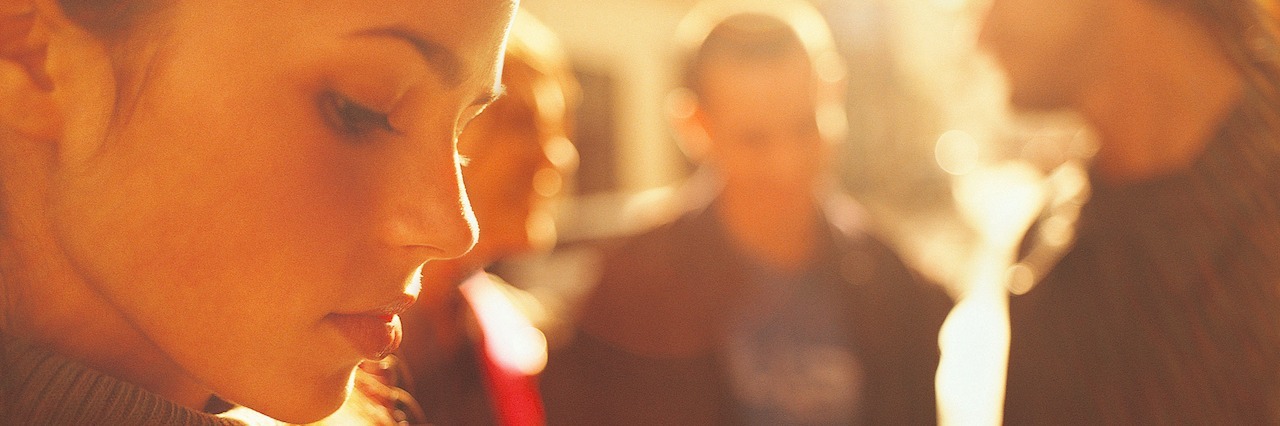 Depression: The Voice of Negative Thinking A woman looking down