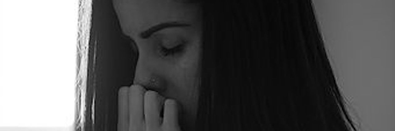 Crohn's Disease in Photos: My Not-So-Invisible Illness woman looking upset