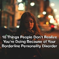 Woman standing on a street in the dark. text reads: 18 things people don't realize you're doing because of your borderline personality disorder