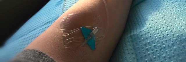 Inside the Mind of a Chronically Ill Person Debating If They Should Post on Facebook arm with iv line in it