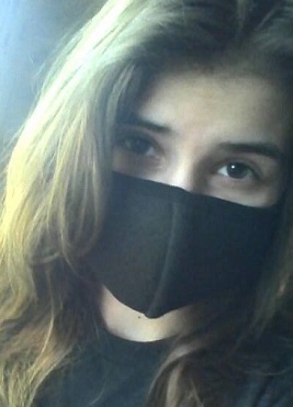 girl wearing black face mask