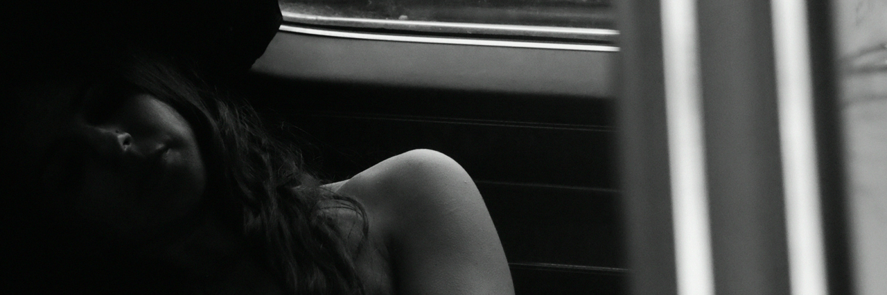 The 'Lost Years' of Grief black and white photo of girl in a hat