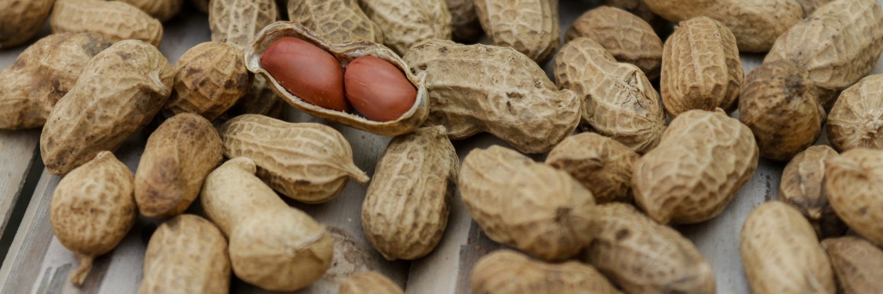 NIH Changes Peanut Recommendations to Help Kids Avoid Peanut Allergies a photo of peanuts in their shells.