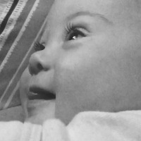 Black and white photo of baby girl
