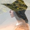Portrait of young woman with hat with double exposure technic combinated with beautiful mountain landscape